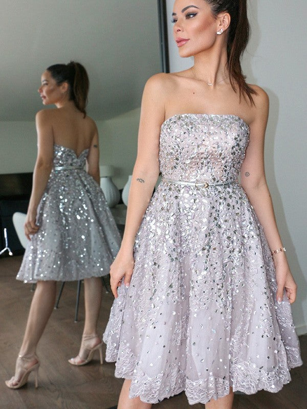 A-Line/Princess Strapless Sleeveless Sequin Knee-Length Tulle Homecoming Dresses