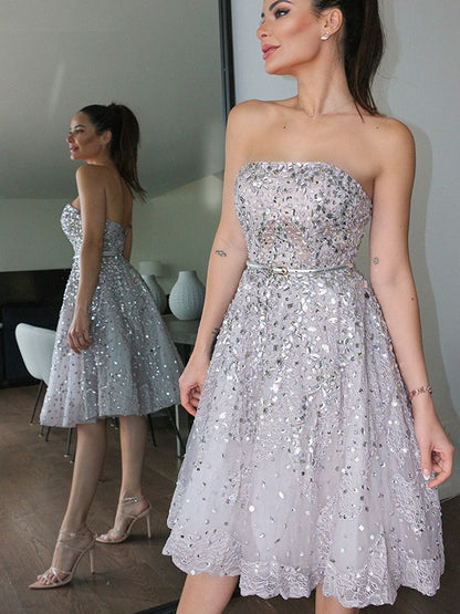 A-Line/Princess Strapless Sleeveless Sequin Knee-Length Tulle Homecoming Dresses